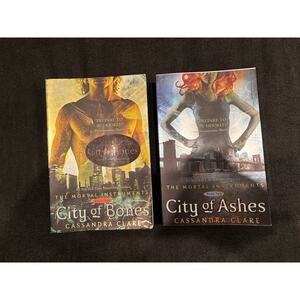 City of Bones and City of Ashes paperback novels. Author Cassandra Clare.